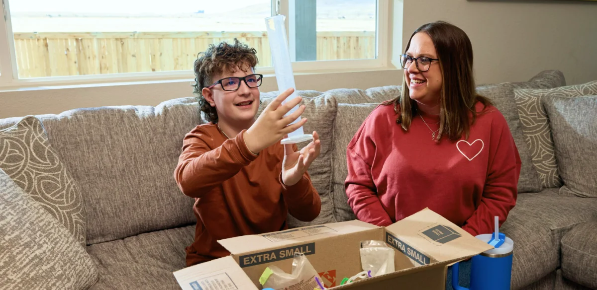 Mother and son opening their school supplies items