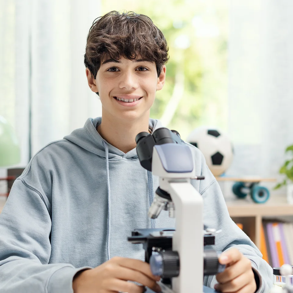 Student using a microscope